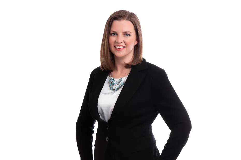 Raleigh NC photographer coaching client for confident professional headshots