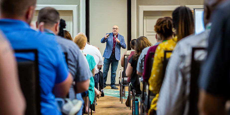 Audience listening and engaging during conference session in Raleigh NC