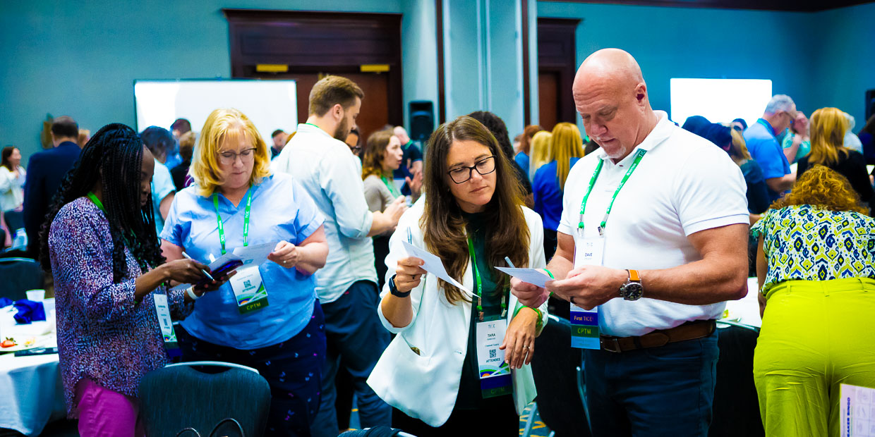 Professionals networking during conference event in Raleigh NC