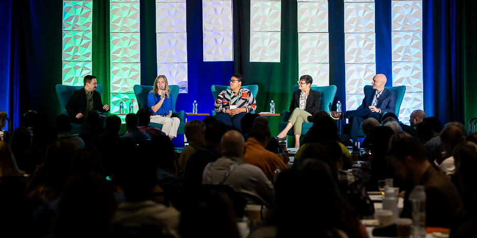 Panel discussion with multiple speakers at conference in Raleigh NC