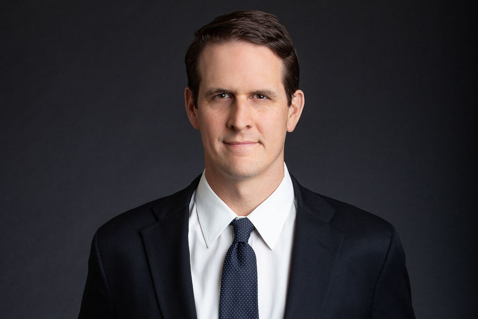 Executive lawyer headshot in Raleigh NC with professional lighting and confident expression