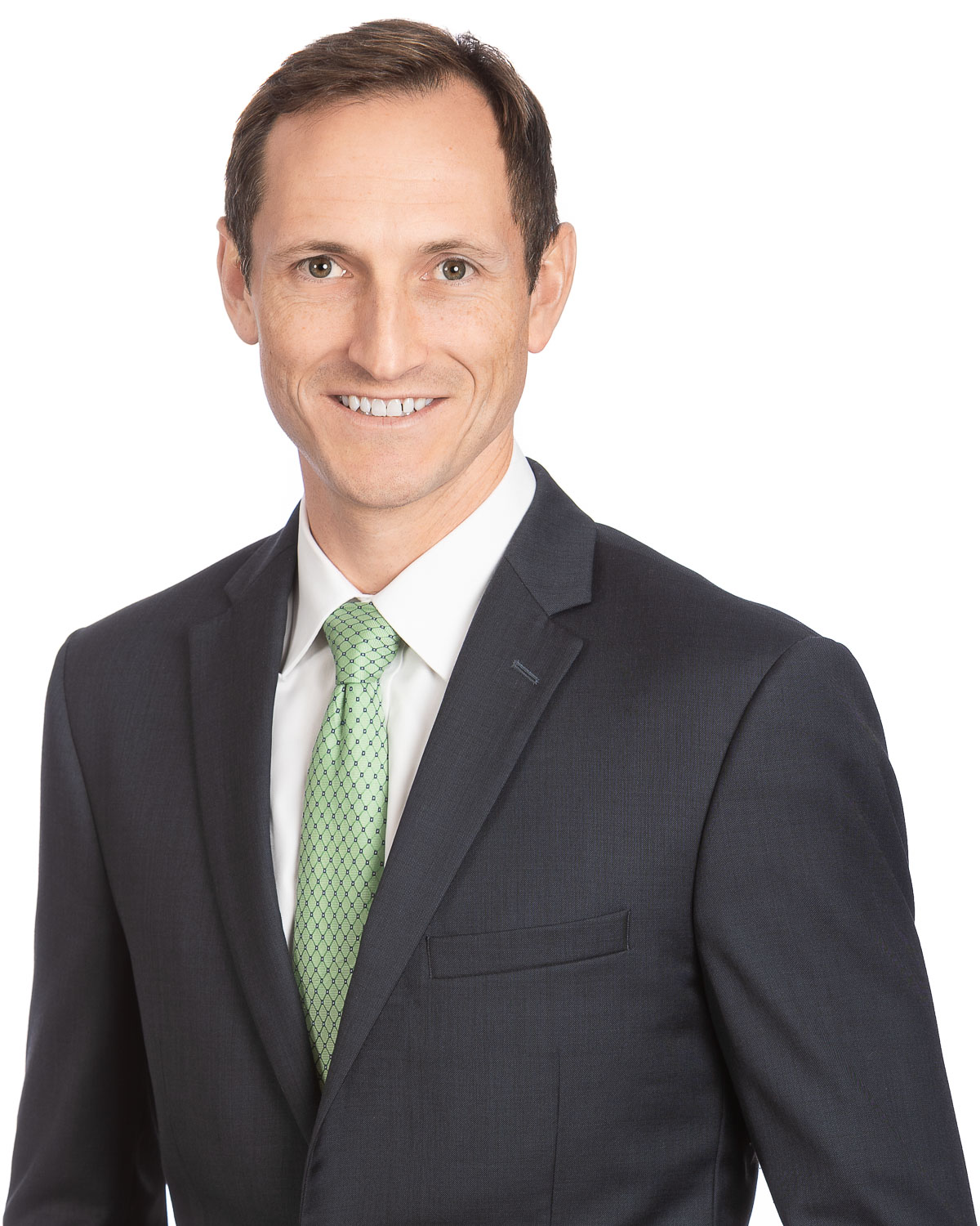 Professional attorney headshot in Raleigh NC with neutral background and polished look