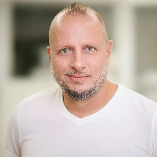 Robert Filcsik professional headshot photographer in Raleigh NC posing on location environment