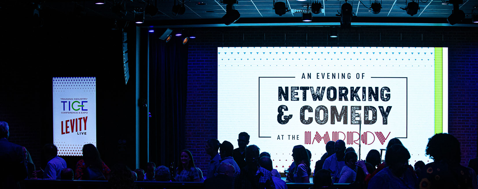 Corporate networking event at Raleigh Improv in Cary, NC, photographed by a Raleigh corporate event photographer Corporate networking event at Raleigh Improv in Cary, NC, photographed by a Raleigh corporate event photographer